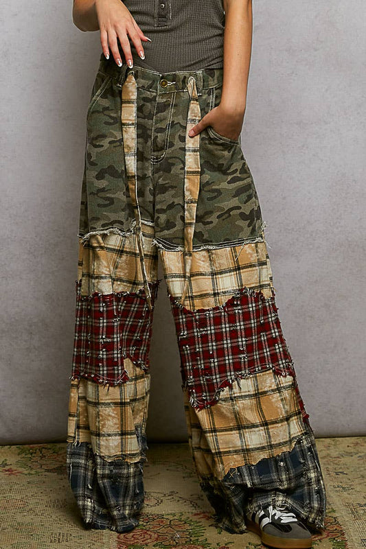 Varied asymmetrical patchwork buckle back detail woven pants