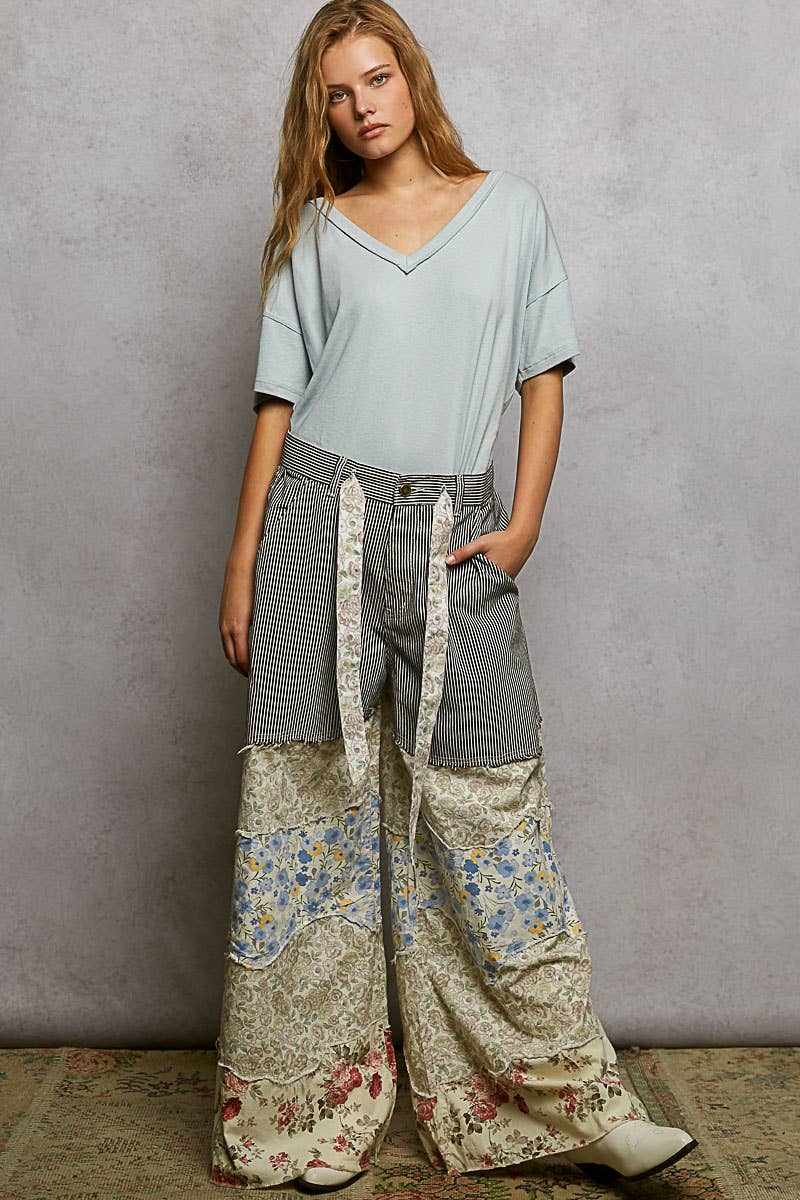 Varied asymmetrical patchwork buckle back detail woven pants