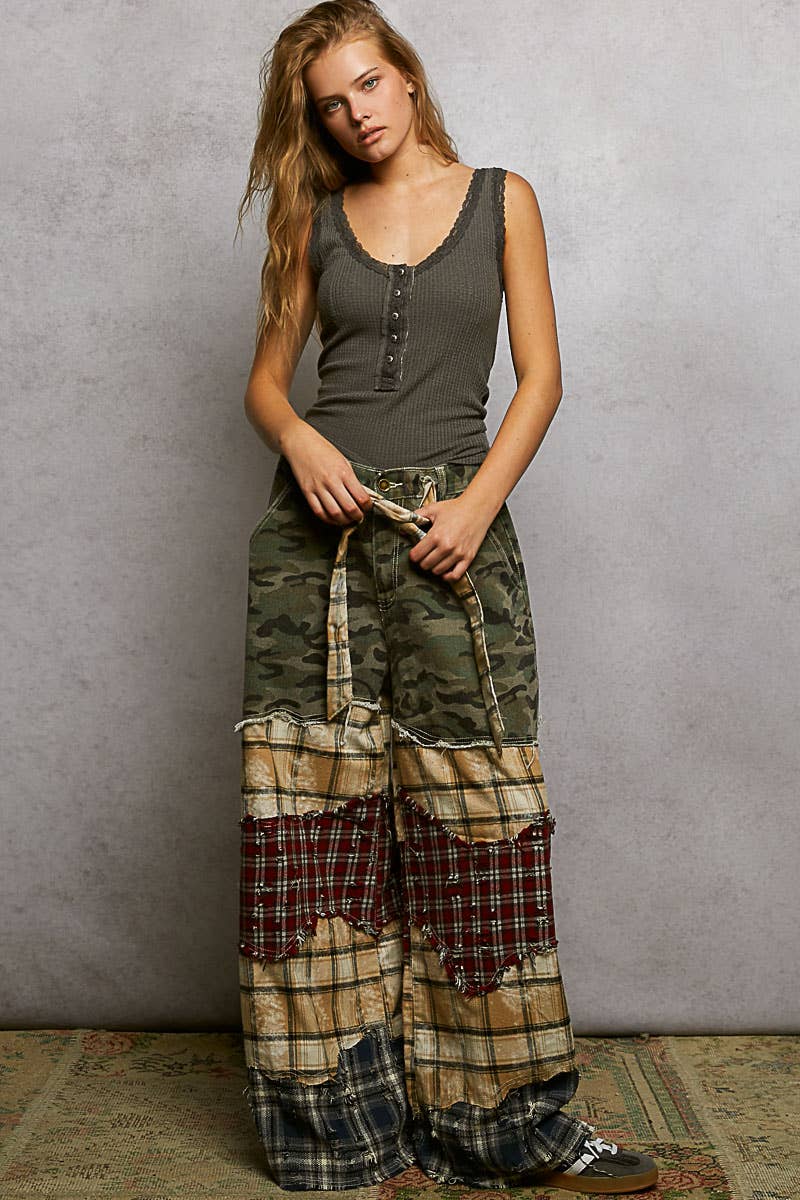 Varied asymmetrical patchwork buckle back detail woven pants