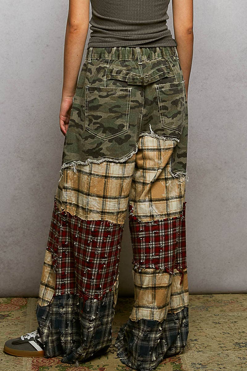 Varied asymmetrical patchwork buckle back detail woven pants
